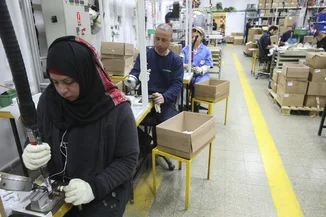 Palestinians and Jews work at a SodaStream factory in the Mishor Adumim industrial park, next to the Maale Adumim. February 2, 2014 Photo by Nati Shohat/Flash90