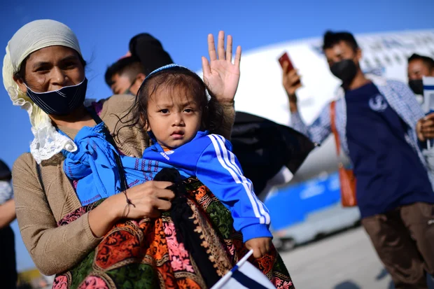 Newly arrived Jewish immigrants from India, members of the 'Bnei Menashe' community arrive to the Ben-Gurion International Airport, October 13, 2021. (Photo: Tomer Neuberg/Flash90)