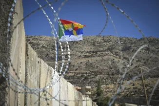 Israeli security forces stand guard at the Israeli border fence with Syria, near the Druze town of Majdal Shams in the Golan Heights, July 19, 2025. Photo by Michael Giladi/Flash90