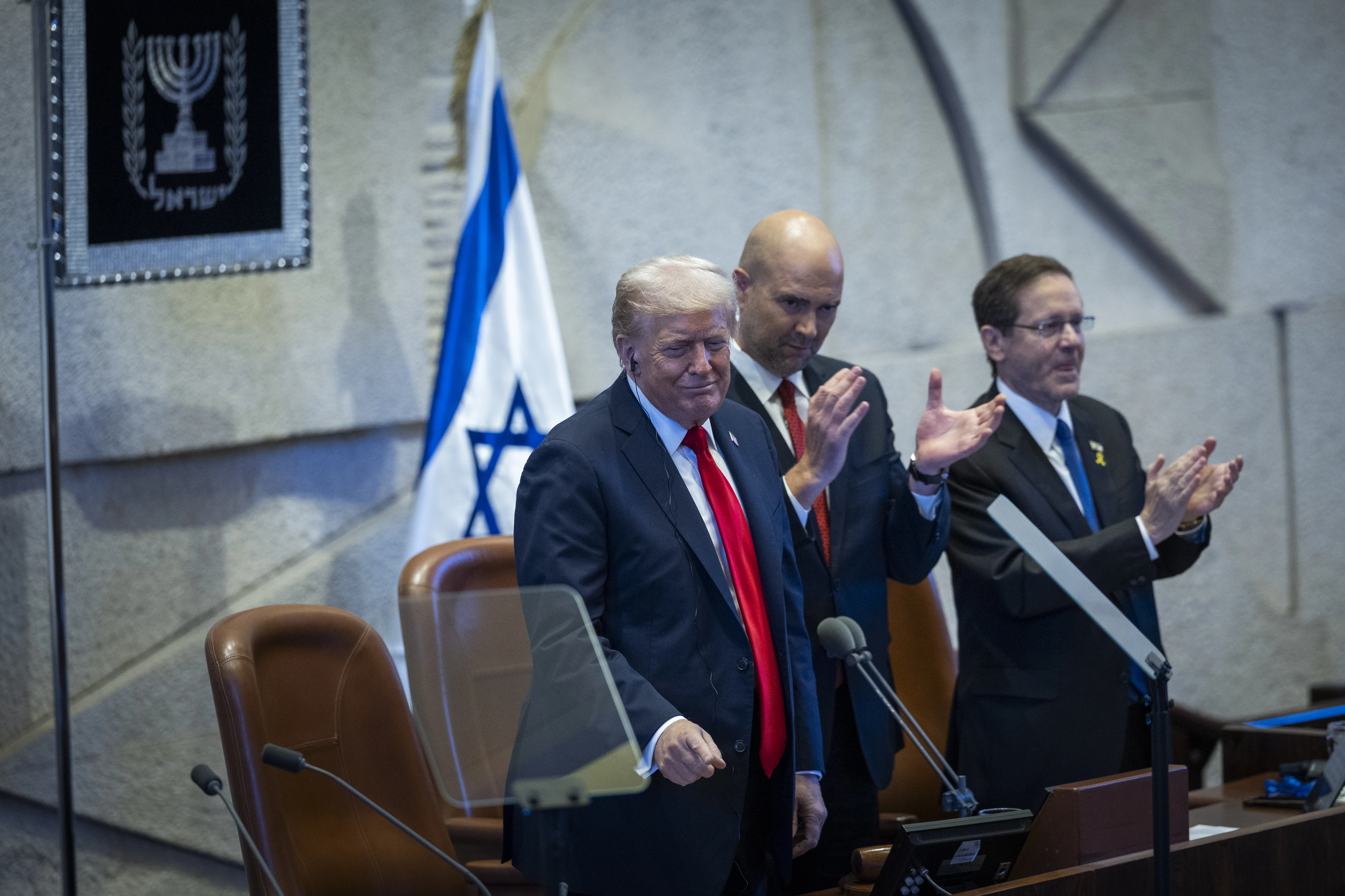 U.S. President Donald Trump with Knesset speaker Amir Ohana and Israeli President Isaac Herzog during a special plenum session in honor of President Trump at the Knesset, Israel’s parliament in Jerusalem, October 13, 2025