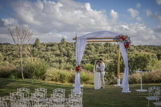 Avia Slotki stands with her groom Micha Goldenberg before their wedding near Beit Shemesh, May 4, 2026. Photo: Chaim Goldberg / Flash 90