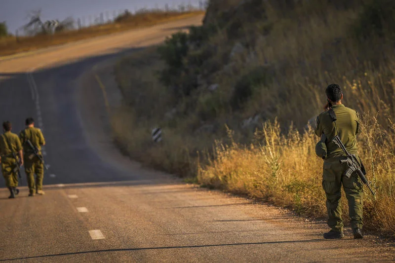 Israeli soldiers are seen along the Israeli border with Lebanon in northern Israel