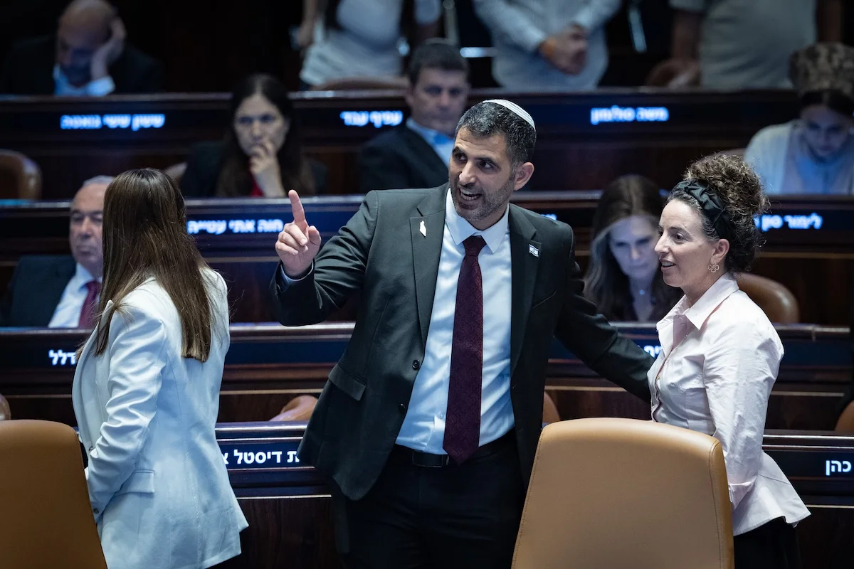 Communications Minister Shlomo Karhi attends a vote at the plenum hall of the Knesset