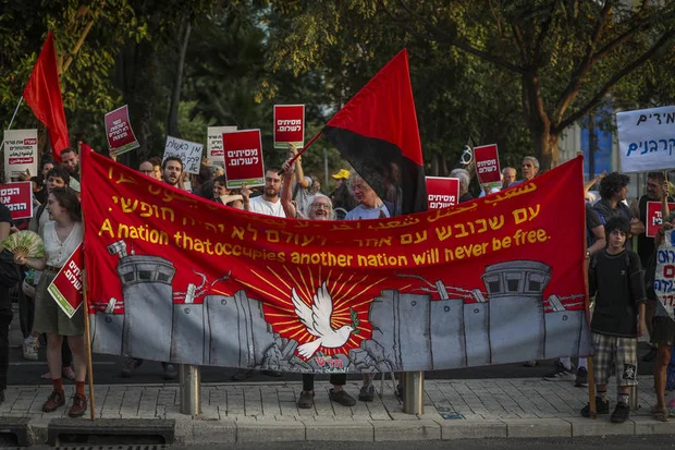 Activists demonstrate against recent violent attacks by extremist Israeli settlers in Tel Aviv, July 25, 2026. Photo by Jamal Awad/Flash90