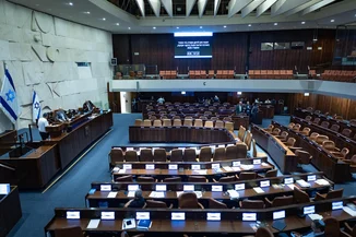 Members of the Knesset attend a plenum session in the assembly hall of the Israeli parliament in Jerusalem, July 28, 2026. Photo by Yonatan Sindel/Flash90