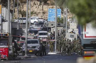 Israeli security forces near the scene of a shooting attack near Hebron, October 23, 2026. (Photo: Wisam Hashlamoun/Flash90)