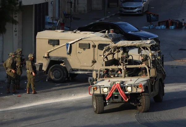 Israeli soldiers take part in a military operation in the West Bank city of Hebron following a shooting attack in the area a few days ago, October 25, 2026. Photo by Wisam Hashlamoun/Flash90