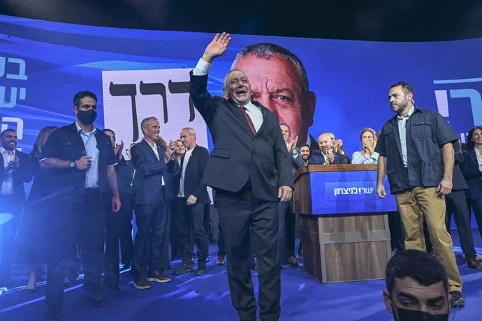 Yashar party chairman Gadi Eisenkot alongside members of his party at the party’s election headquarters in Tel Aviv