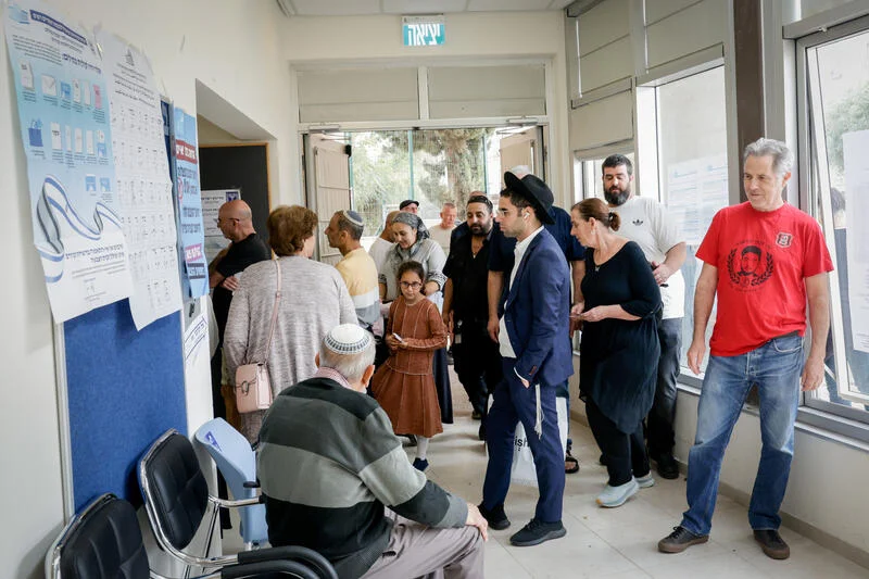Israelis cast their votes at a polling station in Jerusalem