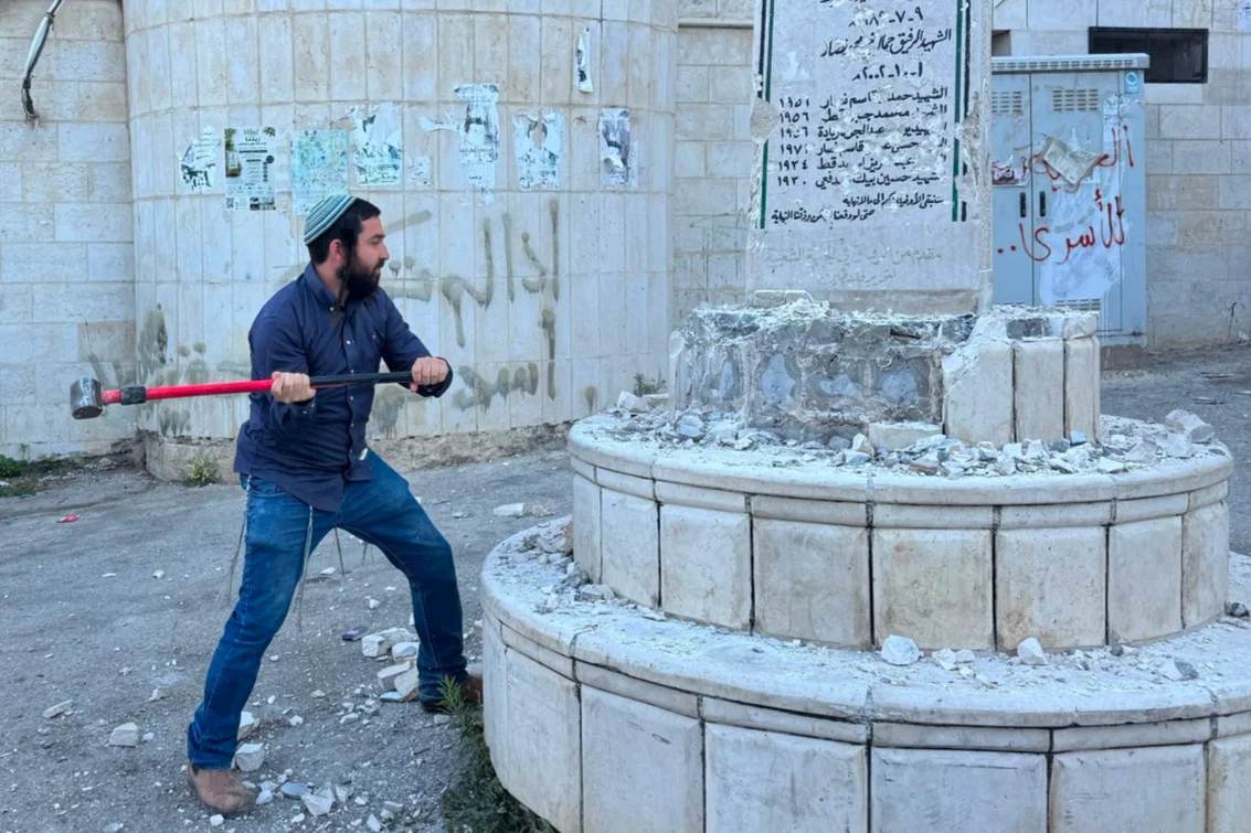 MK Tzvi Sukkot demolishing a memorial for a terrorist in the Palestinian village Madama in Judea and Samaria