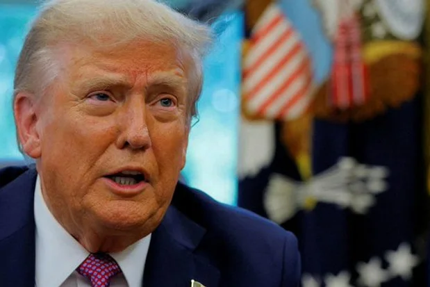 US President Donald Trump speaks with the media on the day of the signing of an executive order to rename the Department of Defense the 