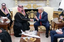 U.S. President Donald Trump shakes hands with with Saudi Crown Prince Mohammed bin Salman as they meet in the Oval Office