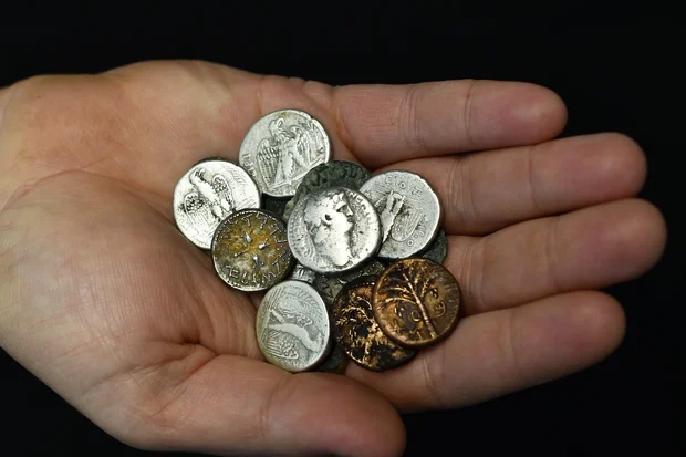 The rare 2,000-year-old Hebrew coins. (Photo: Yoli Schwartz, Spokesperson/Israel Antiquities Authority)