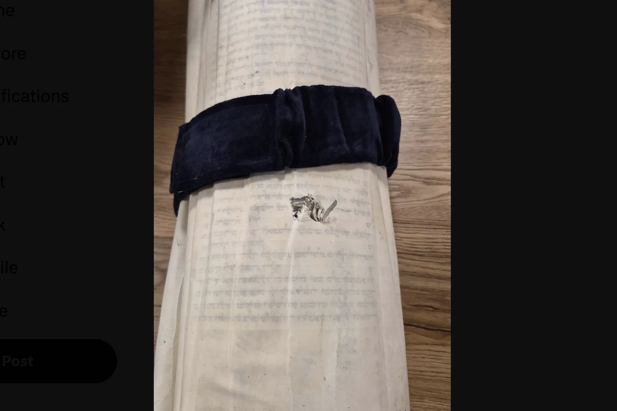 Shrapnel from Iranian missile torah scroll