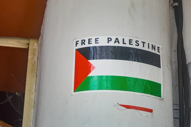 Anti-Israel activists stick 'Free Palestine' stickers on luggage of El Al passengers