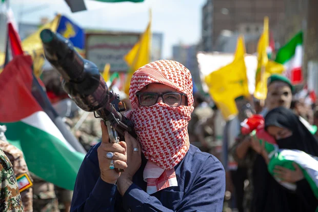 A Palestinian man holding an Al-Yassin 105 anti-tank rocket launcher during International Al-Quds Day in Tehran, Iran, April 5, 2024. (Photo: Shutterstock)