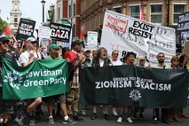 Green Party protesters march in a pro-Palestinian rally, London, UK