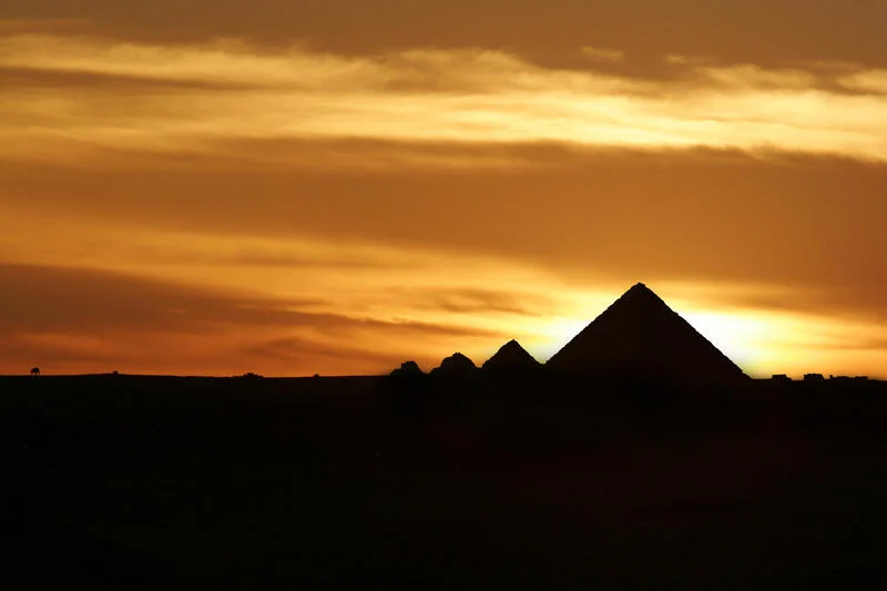 Silhouette of the historical site of the Giza Pyramids